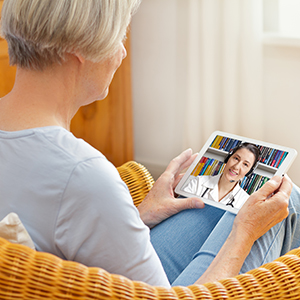 Summit Surgeons patient talking to a doctor via TeleHealth.